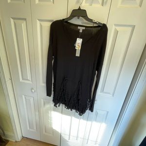 Long sleeved ladies top with fringe decor
